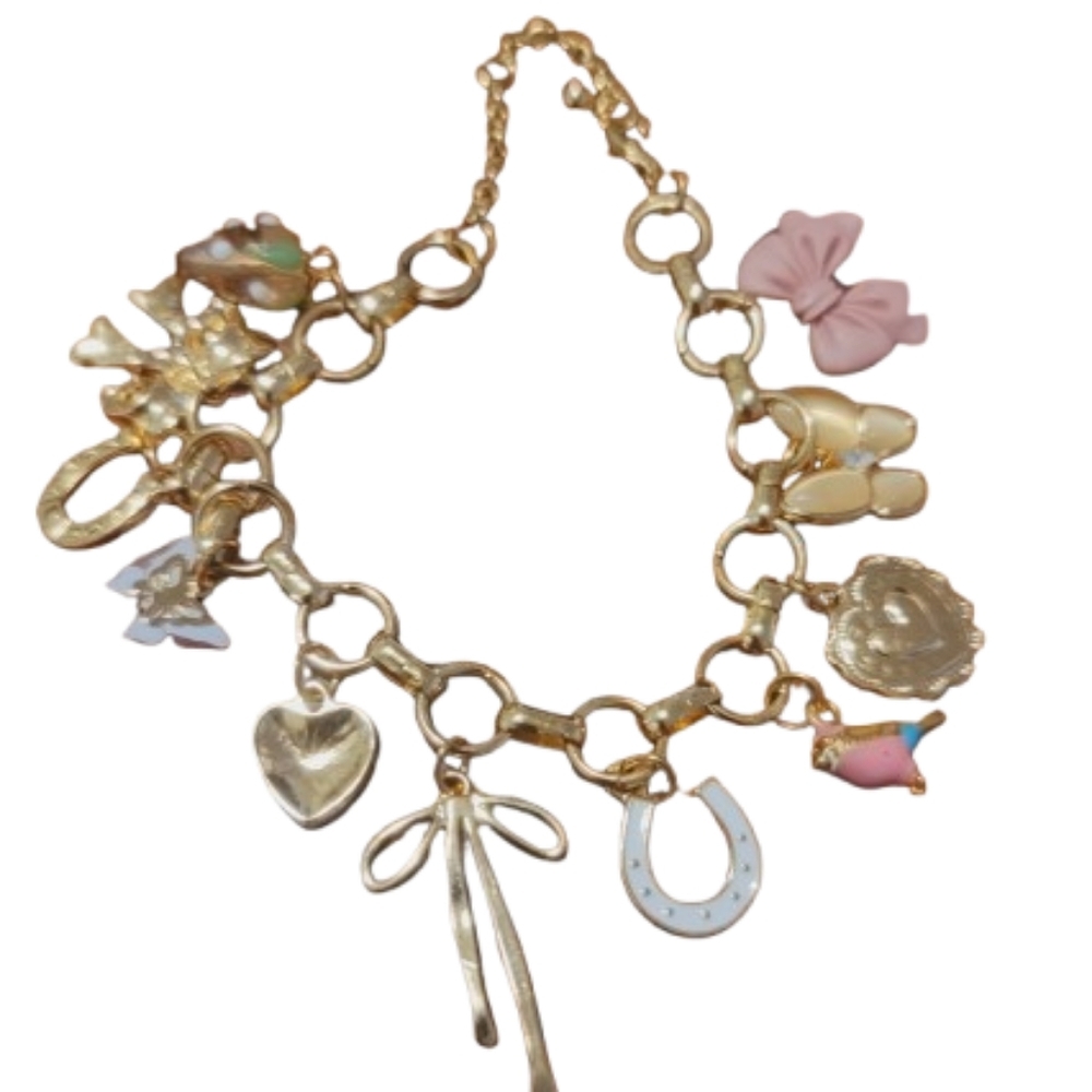 Layla charm bracelet. Vintage-style charm bracelet layered with romantic charms